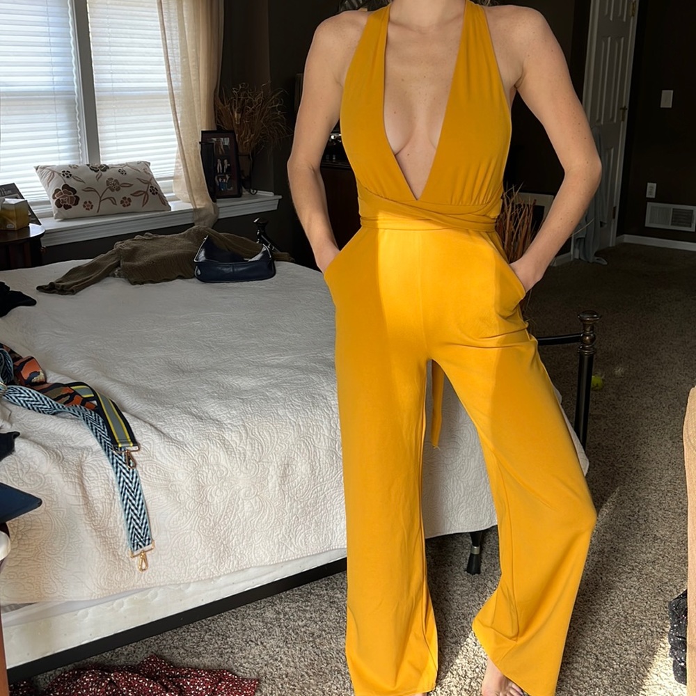 Yellow jumpsuit with pockets and deep v neckline -wear multiple ways!
